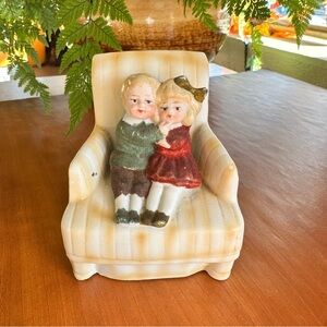 Charming Ceramic Figurine with Children on Chair